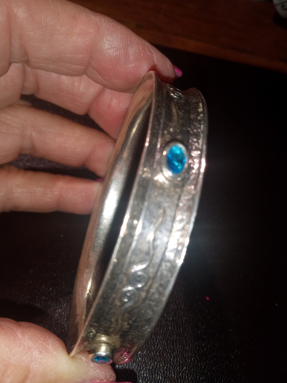 Silver-Tone Bangle Bracelet with Bright Blue Topaz Accent Gem